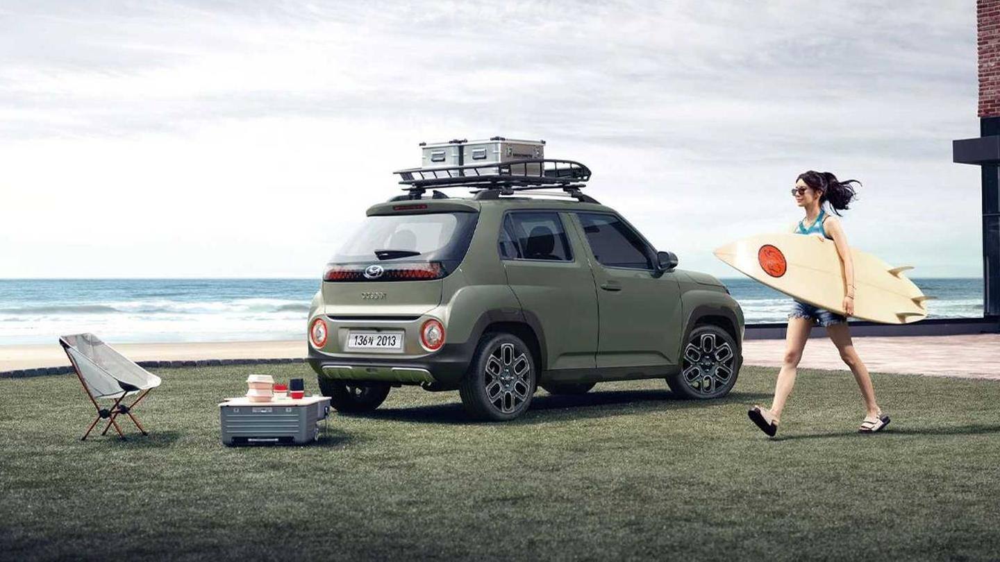 The car has roof rails and rounded headlights The car has roof rails and rounded headlights