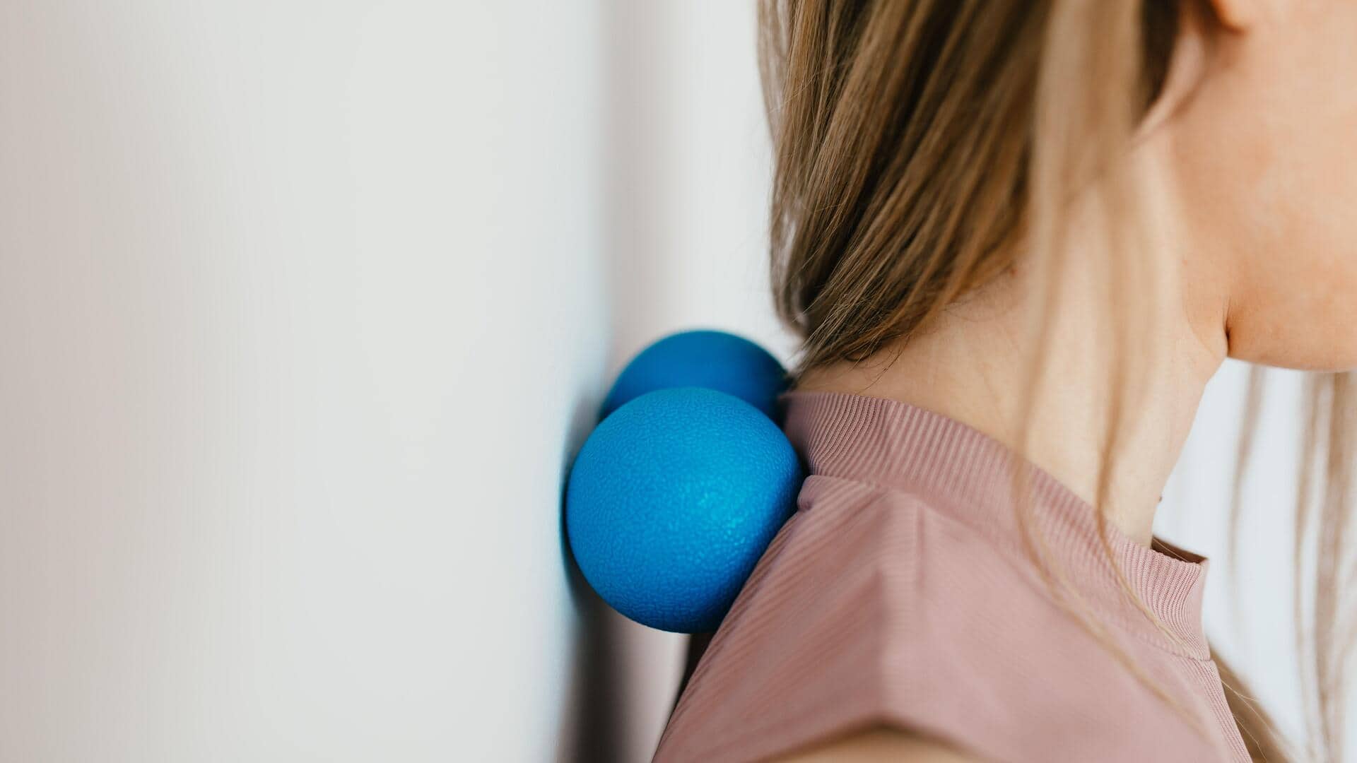 Try wall slides to ease neck tension and improve posture