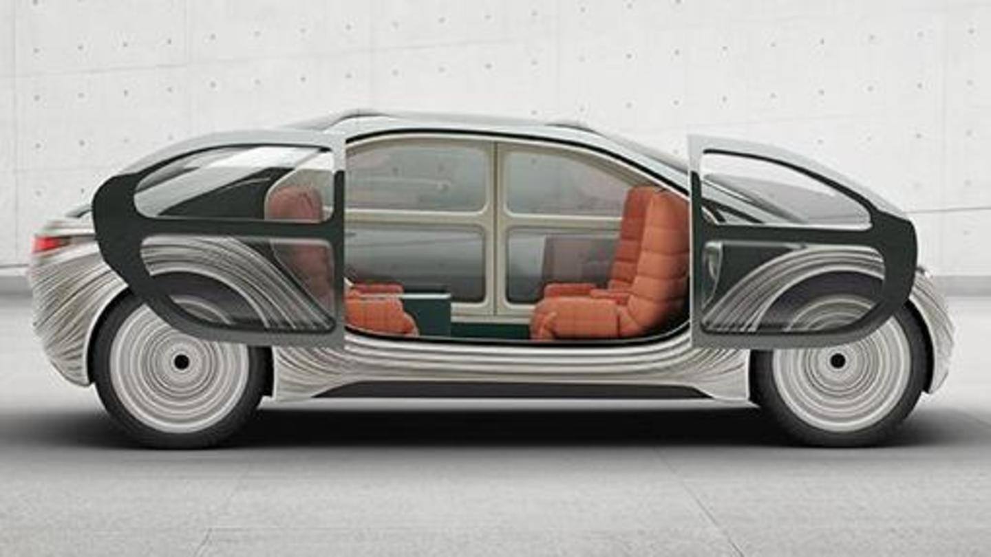 The car has a full-width headlight and sliding doors The car has a full-width headlight and sliding doors