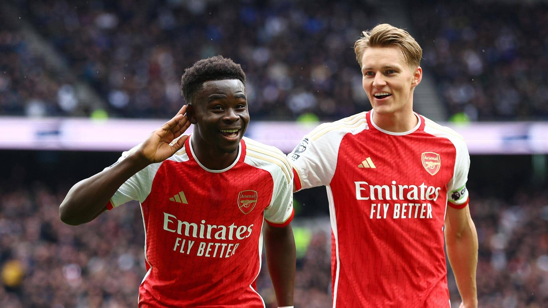 Premier League: Arsenal overcome Tottenham 3-2 in North London derby