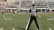 Mengapa wasit memakai baju bergaris?