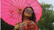 Desain payung yang mengangkat fesyen musim hujan India