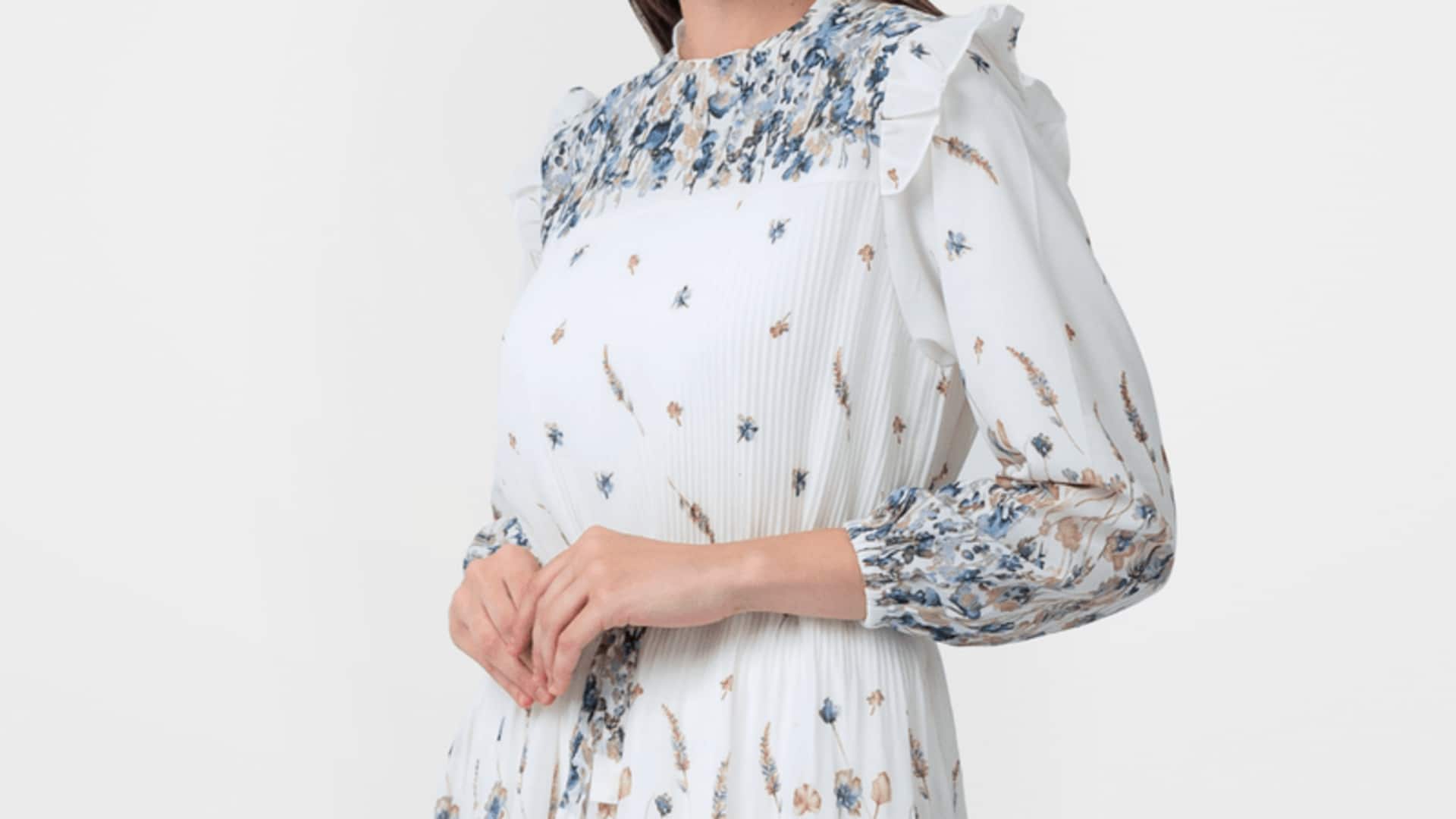 Lima cara memakai tunik plisket untuk musim dingin