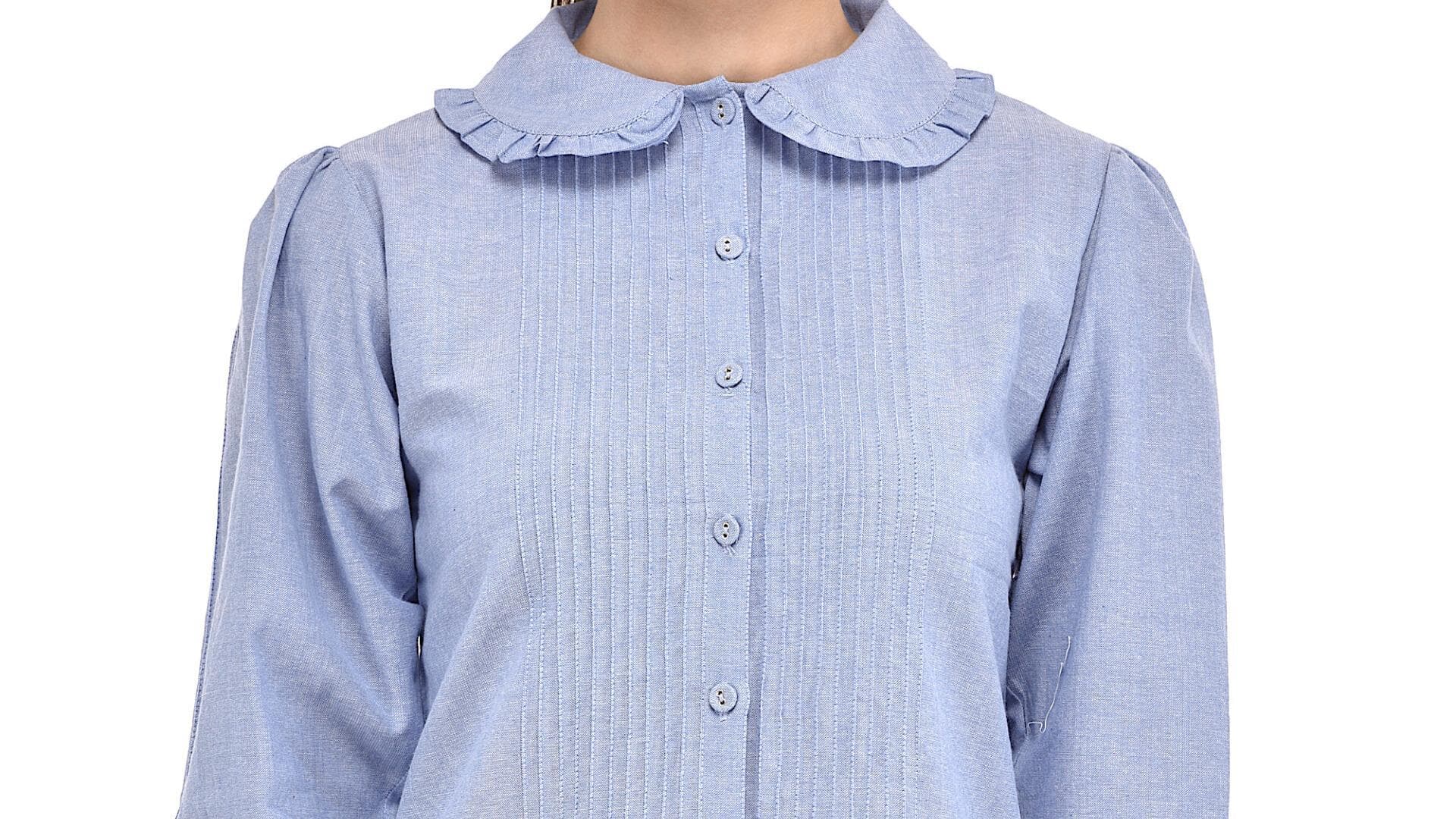 Blus kerah Peter Pan klasik untuk musim dingin di India