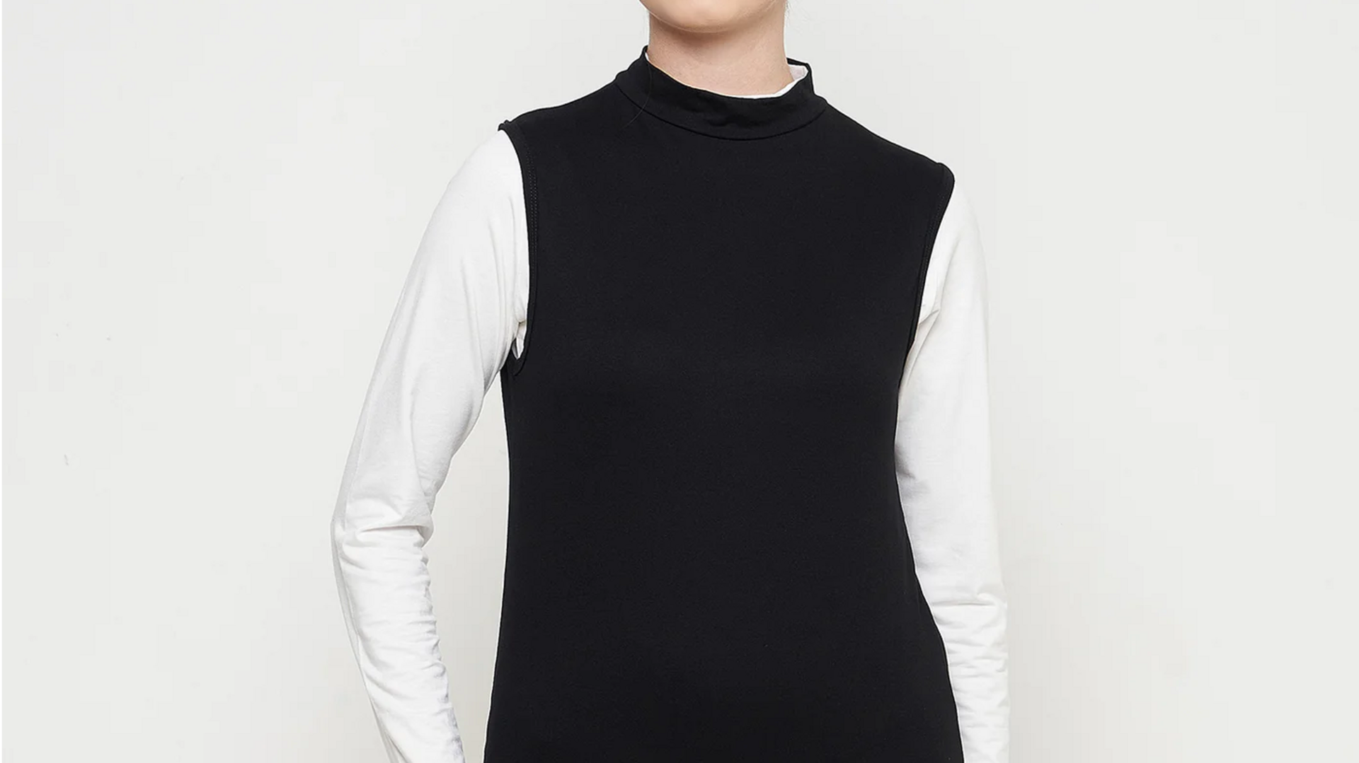 Lima cara cerdas memadukan turtleneck tanpa lengan di musim dingin