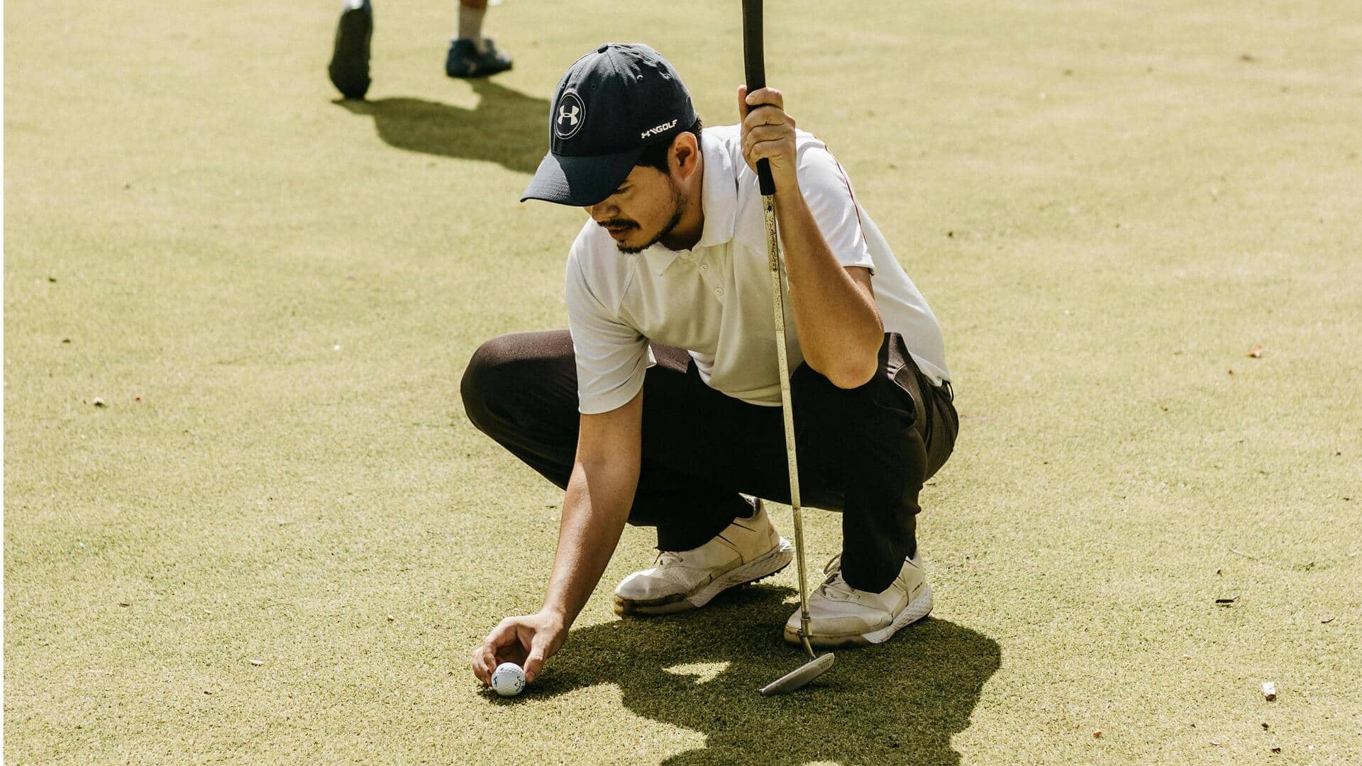 Mengapa pegolf profesional membawa 14 stik?