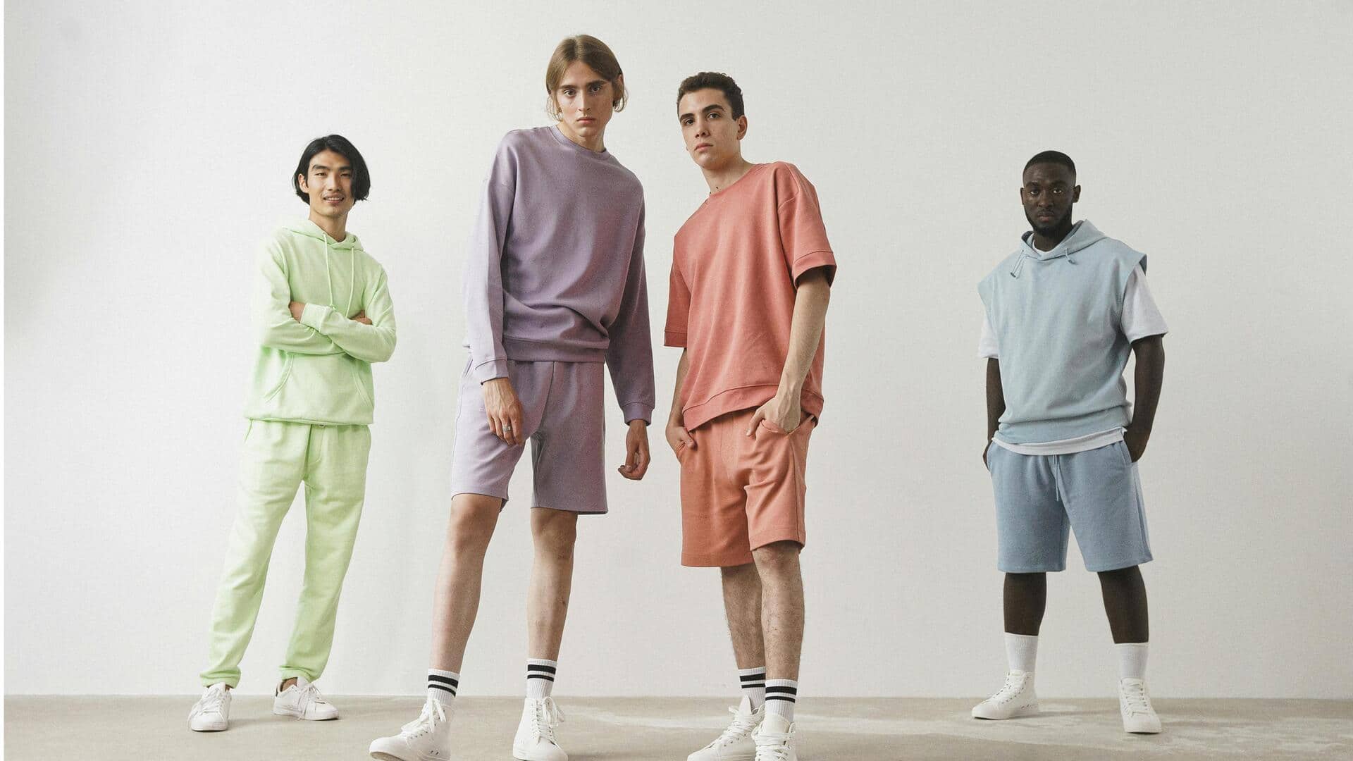 Eksplorasi pria dengan setelan pastel untuk gaya modern