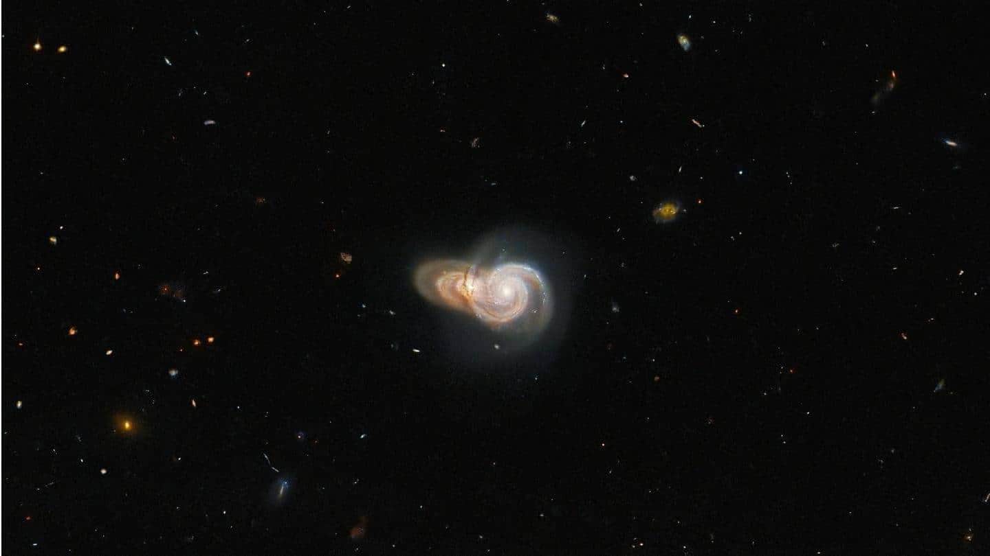 Teleskop Hubble potret dua galaksi tumpang-tindih: Nyatakah?