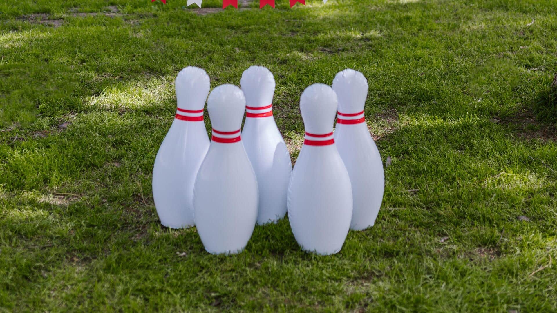 Mengapa pin bowling memiliki garis merah? Asal-usul yang menarik