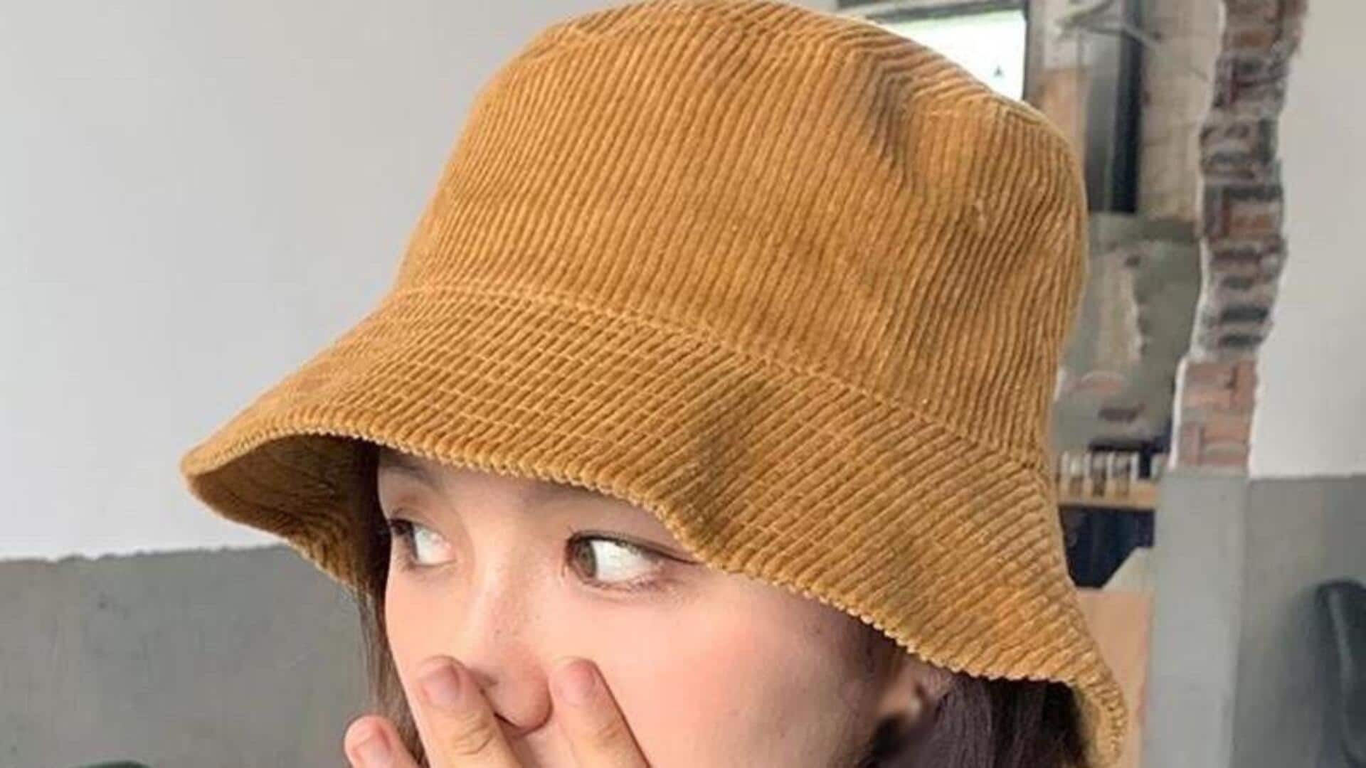 Trik gaya musim dingin India dengan bucket hat korduroi