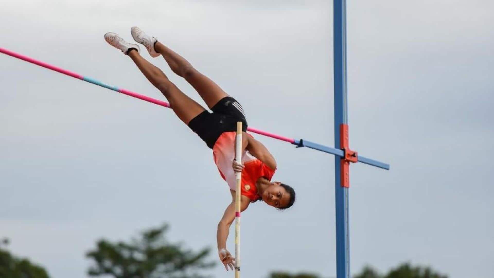 Mengapa tiang lompat galah terbuat dari fiberglass?