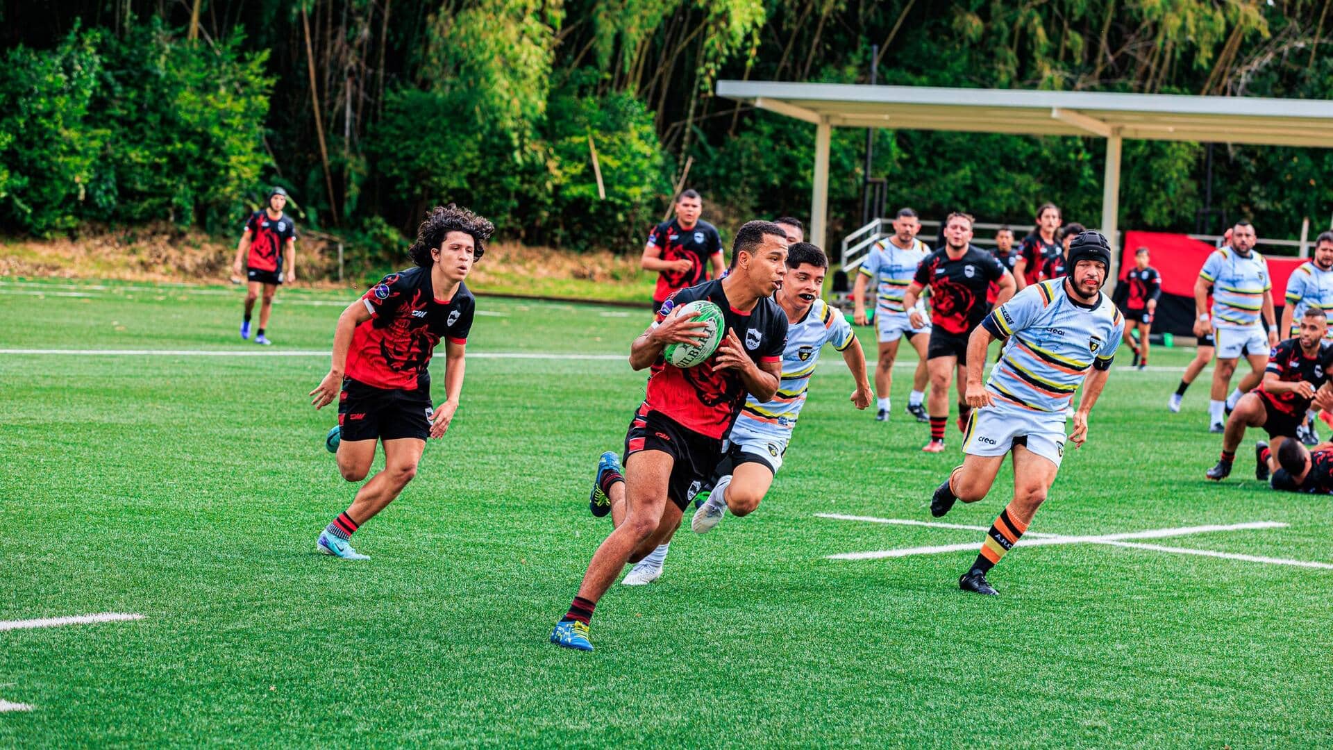 Mengapa lapangan rugby tidak memiliki tiang gawang di tengah?