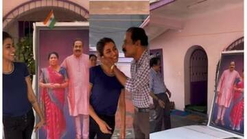 தன் பெற்றோருக்கு பெரியளவு உருவப்படத்தை பரிசளித்த இளம்பெண் - வைரல் வீடியோ