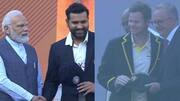 టీమిండియా కెప్టన్ రోహిత్ శర్మకు టోఫిని అందించిన ప్రధాని మోదీ
