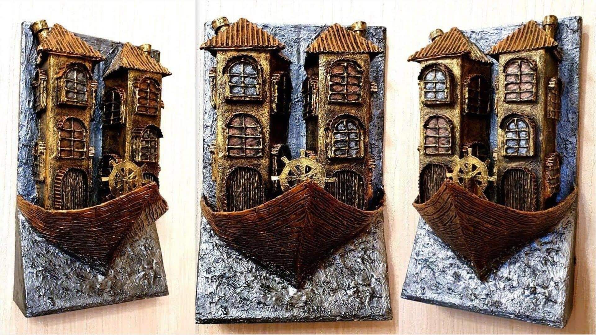 งานศิลปะบนผนังจากกระดาษแข็งรีไซเคิล