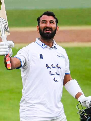 County cricket: Pujara scores double-ton