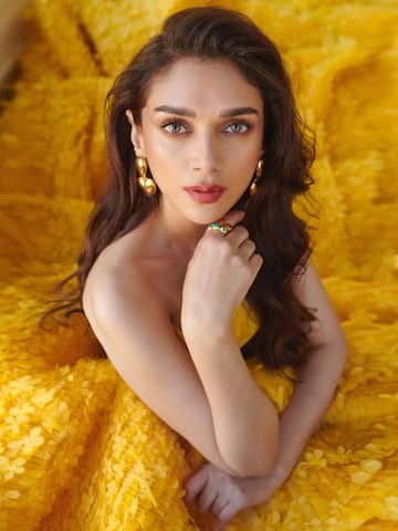 Aditi sparkles in bright yellow ensemble